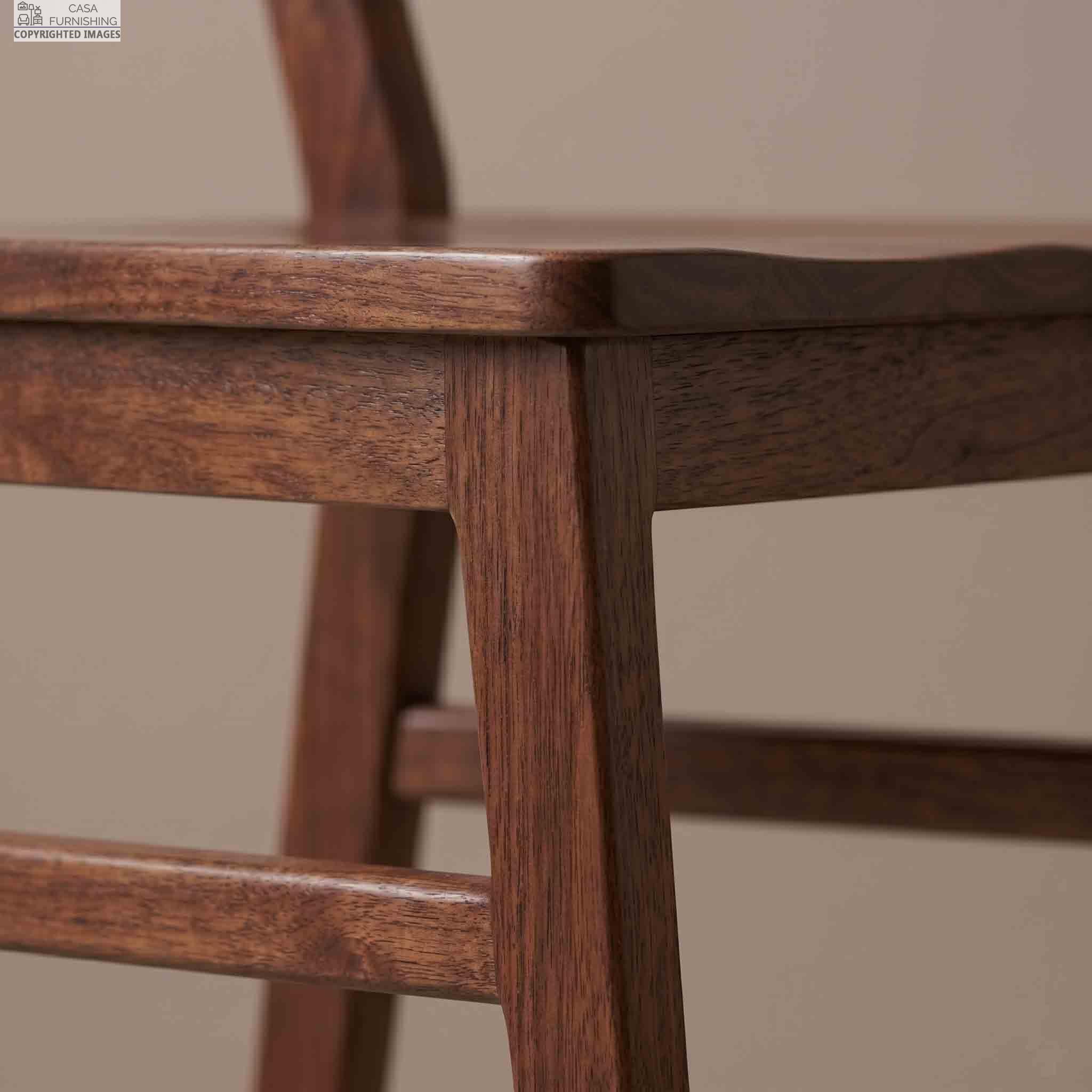Close Up Detail of Premium Solid Wood Dining Chair Leg and Natural Grain Finish