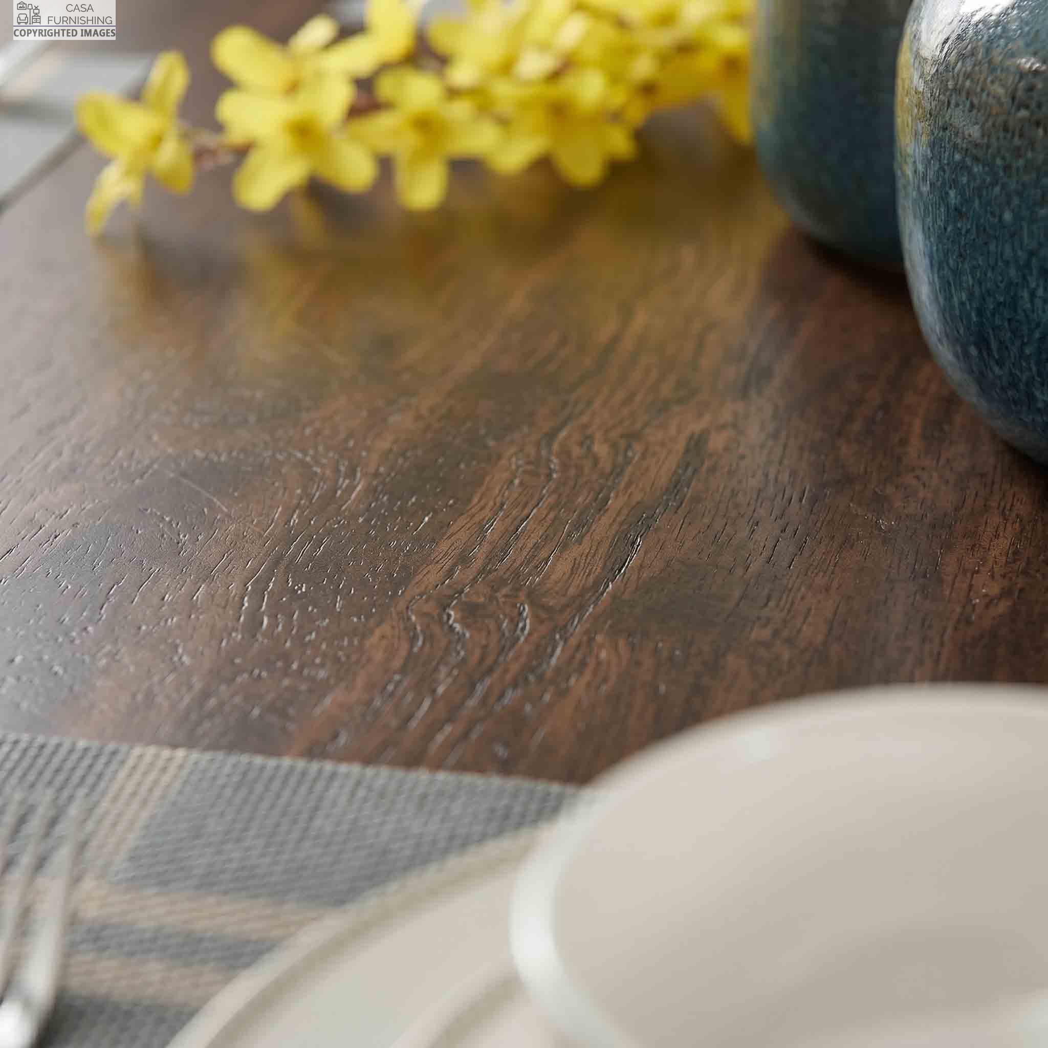 Close-Up-Texture-of-Dark-Walnut-Finish-Solid-Wood-Dining-Tabletop Detailed close-up of a smooth, polished honey-finish solid wood tabletop surface, showcasing organic grain textures.