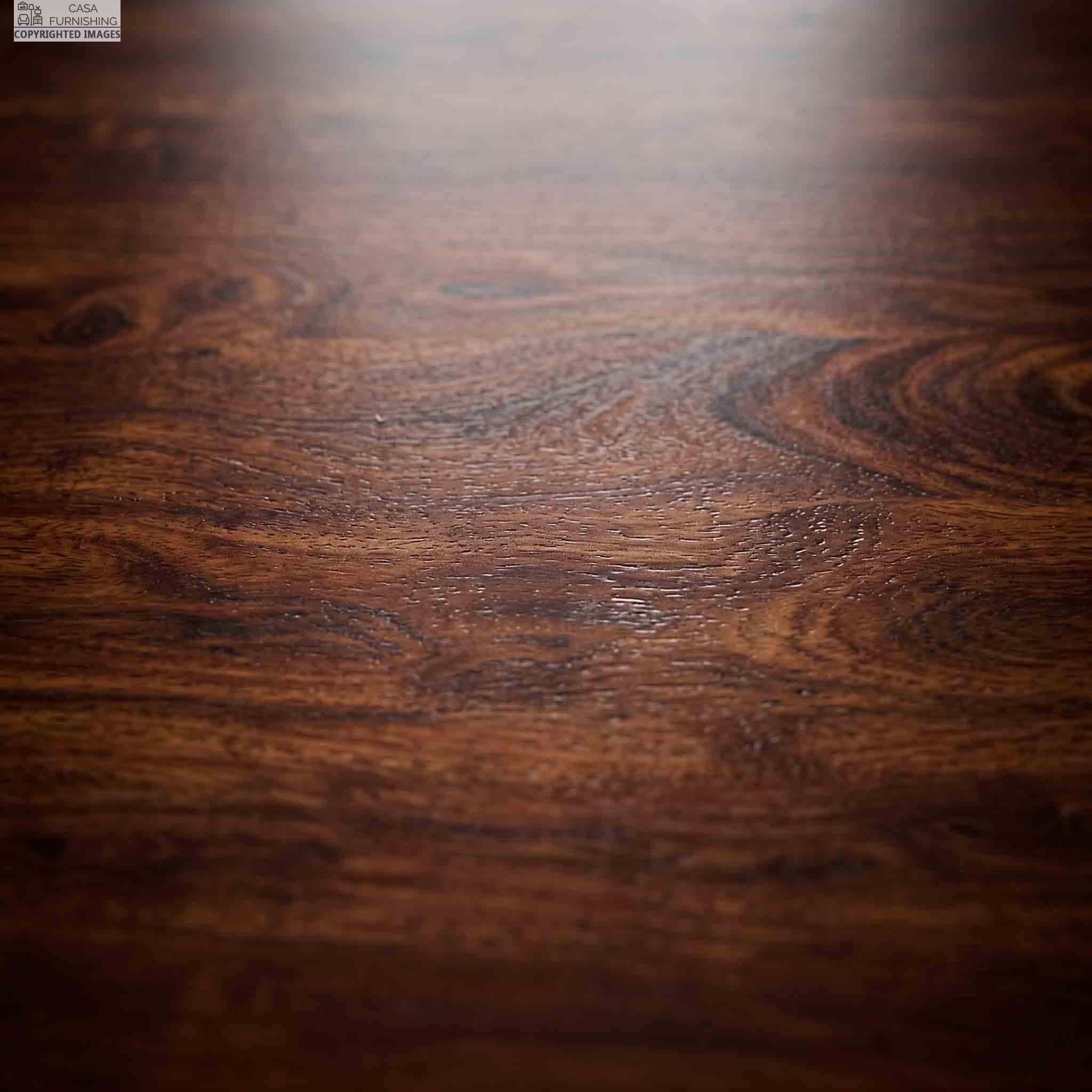 Premium-Sheesham-Wooden-Texture-and-Grain-Finish-Background Macro texture shot showcasing the rich natural grain patterns and dark polished finish of a premium Sheesham solid wood tabletop.