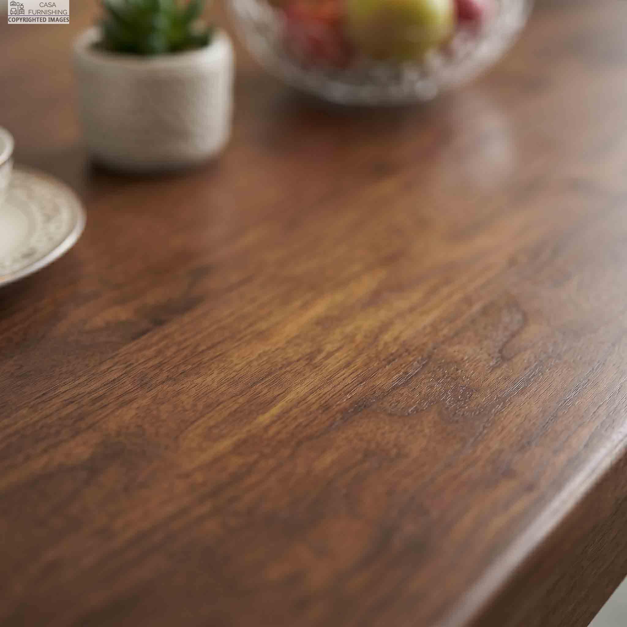 Premium Walnut Finish Solid Wood Table Top Texture Close Up Macro detail shot of a beautifully turned and carved solid wood dining table leg, highlighting premium joinery and natural wood grain.