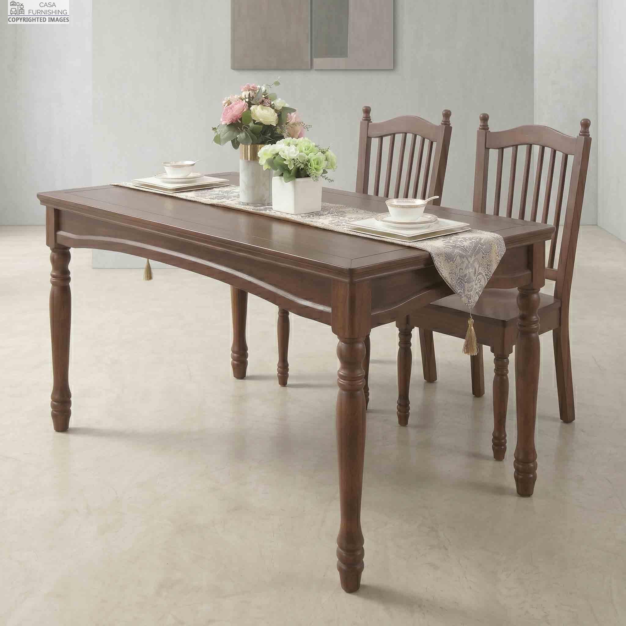Rustic-Sheesham-Wood-Dining-Table-with-Turned-Legs-for-Home Side view of a premium rectangular dark walnut finish solid wood dining table paired with matching traditional slatted-back chairs.