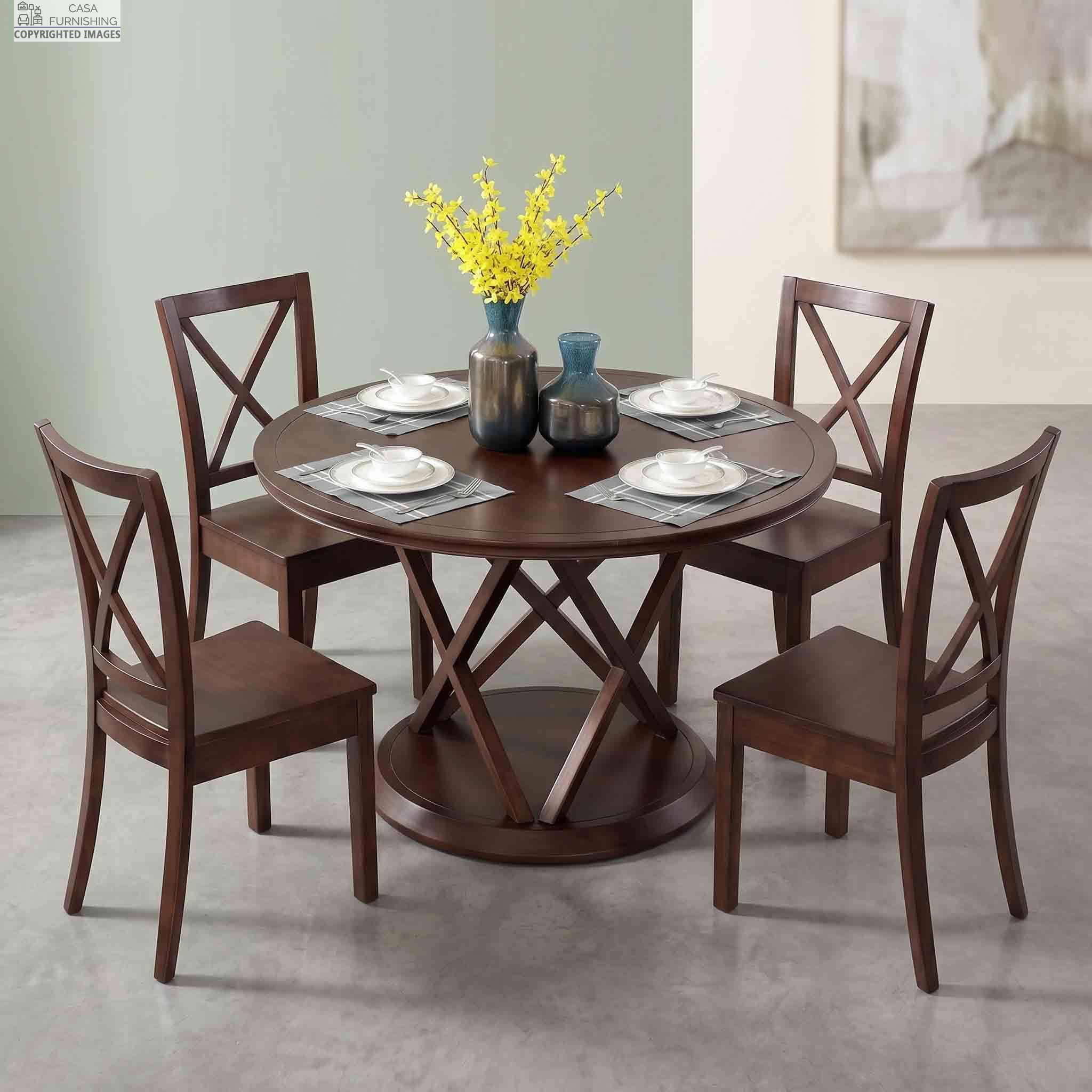 Solid-Sheesham-Wood-Round-Dining-Table-with-4-Cross-Back-Chairs-Set Elegant round wooden dining table showcasing an intricate geometric interlocking pedestal base, surrounded by four classic X-back dining chairs.
