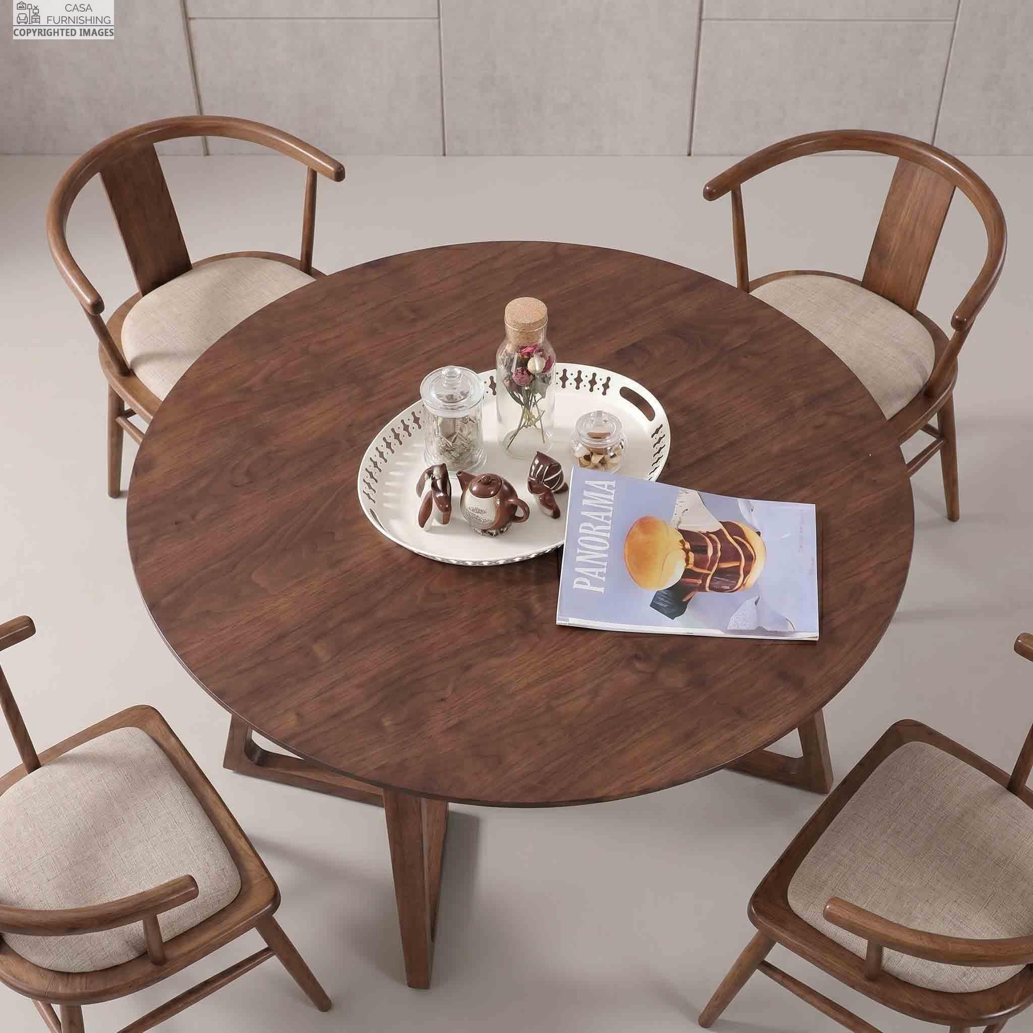 Solid-Wood-Round-Dining-Table-Set-with-4-Chairs-Top-View High-angle view of a luxury round solid wood dining table set with four matching cushioned wooden dining chairs.