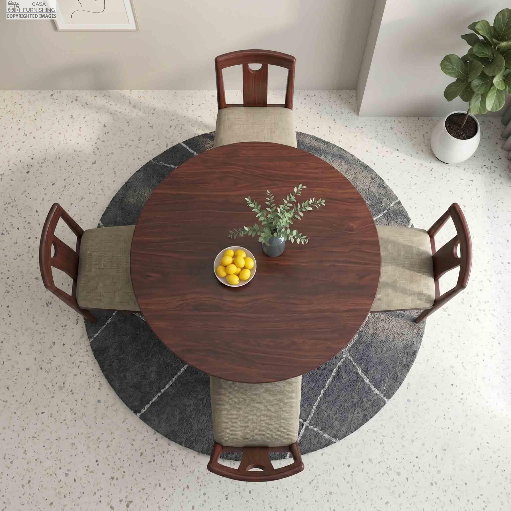 modern-round-sheesham-wood-4-seater-dining-table-set-top-view Birds-eye view of a 4-seater round wooden dining table set highlighting the symmetrical seating arrangement and rich wood finish.