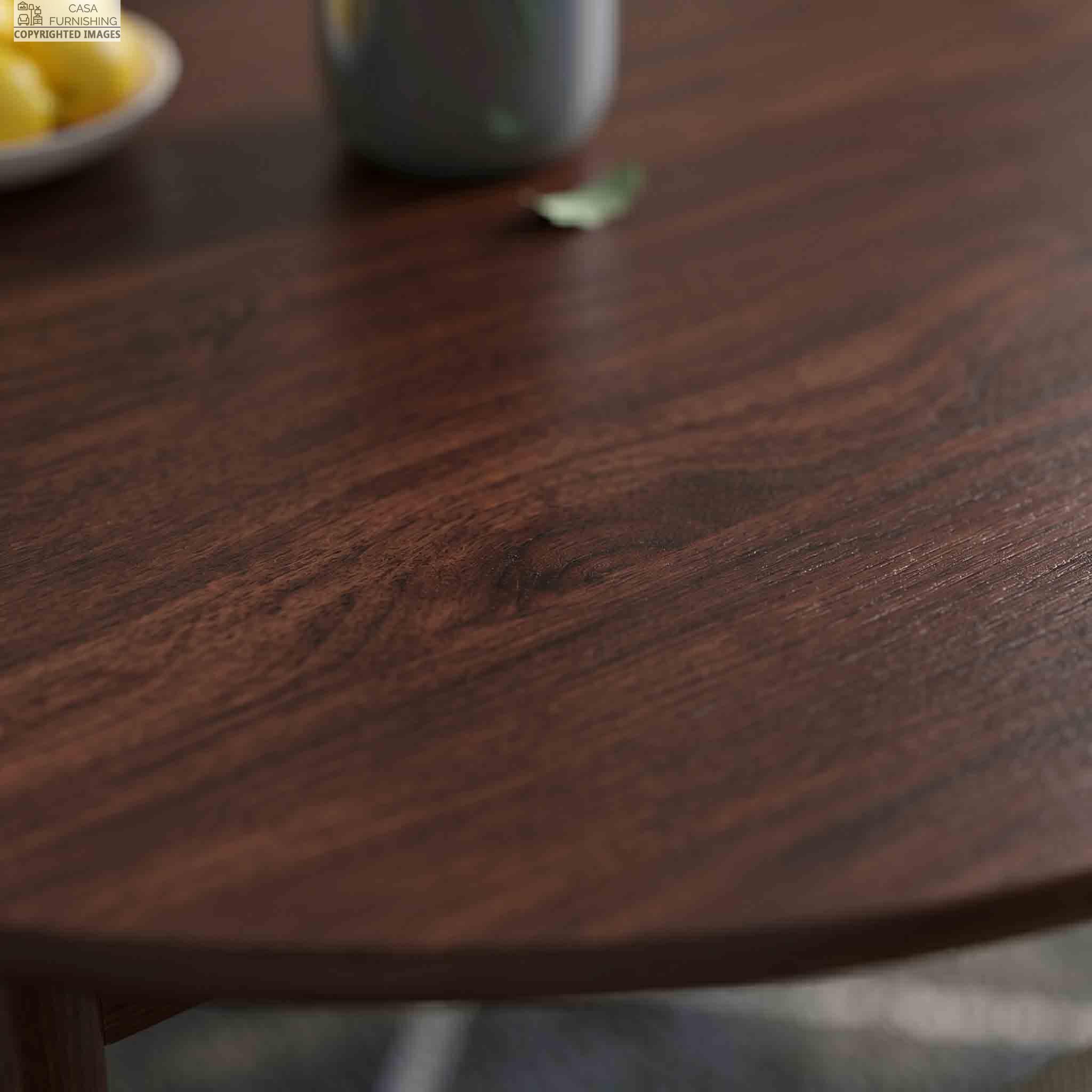 premium-sheesham-wood-dining-tabletop-texture-close-up Macro texture shot showcasing the durable polished surface and rich dark wood grain of a Casa Furnishing solid wood tabletop.