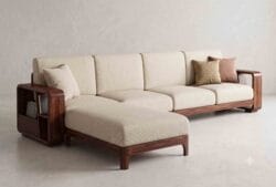 Modern solid wood L-shaped sectional sofa with cream fabric cushions and an integrated magazine holder side-table armrest.