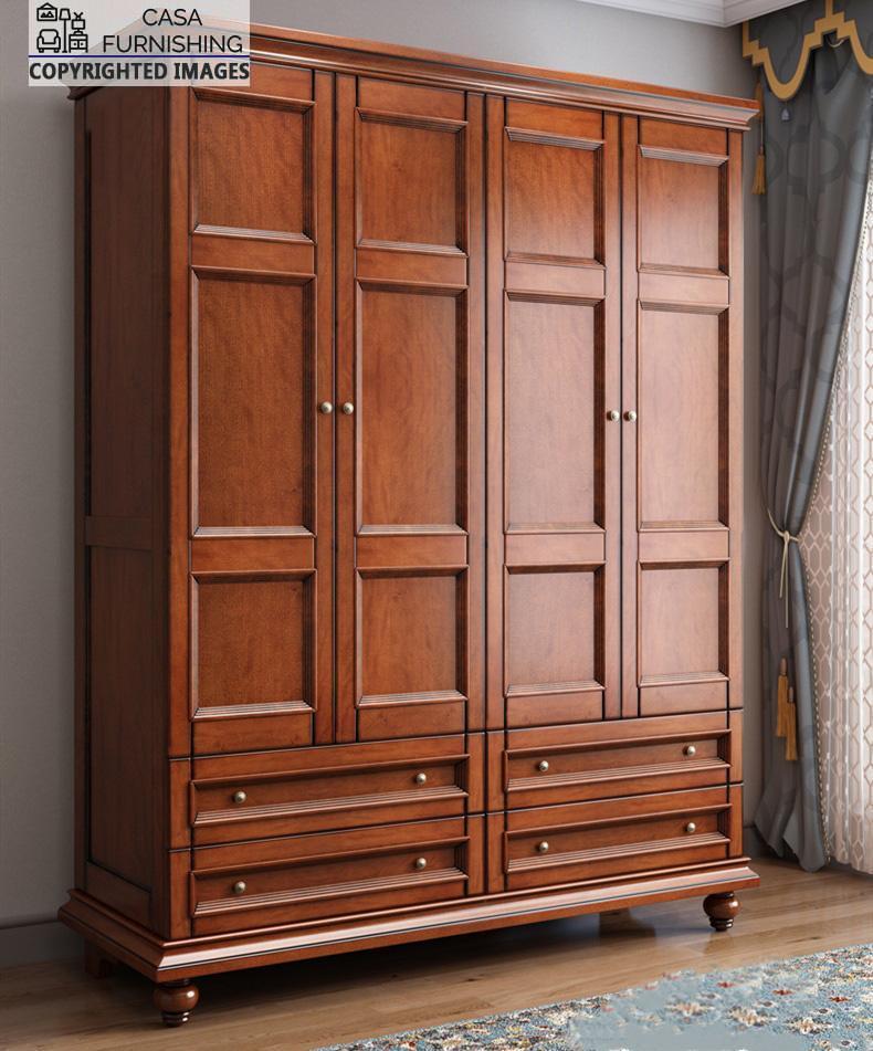 4-door-wardrobe-with-drawers-1.jpg Timeless premium bedroom almirah crafted from high-quality solid wood featuring a rich brown finish and elegant traditional paneled shutters.