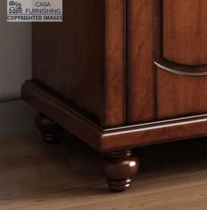 Detailed lower corner view of the premium solid wood wardrobe, highlighting the side profile depth, rich grain finish, and sturdy turned wooden feet layout.