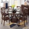 Round solid wood dining table set with 6 cross-back chairs in a dark walnut finish by Casa Furnishing, featuring a unique geometric pedestal base.
