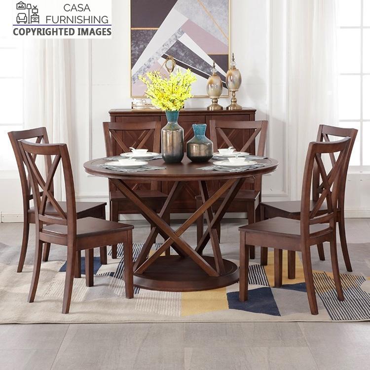 6-seater-round-dining-table-5-1-1-1.jpg Round solid wood 6-seater dining table set featuring cross-back chairs in a dark walnut finish, handcrafted by Casa Furnishing.