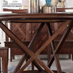 Close-up of the unique geometric pedestal base of a handcrafted solid wood dining table in a dark walnut finish by Casa Furnishing.