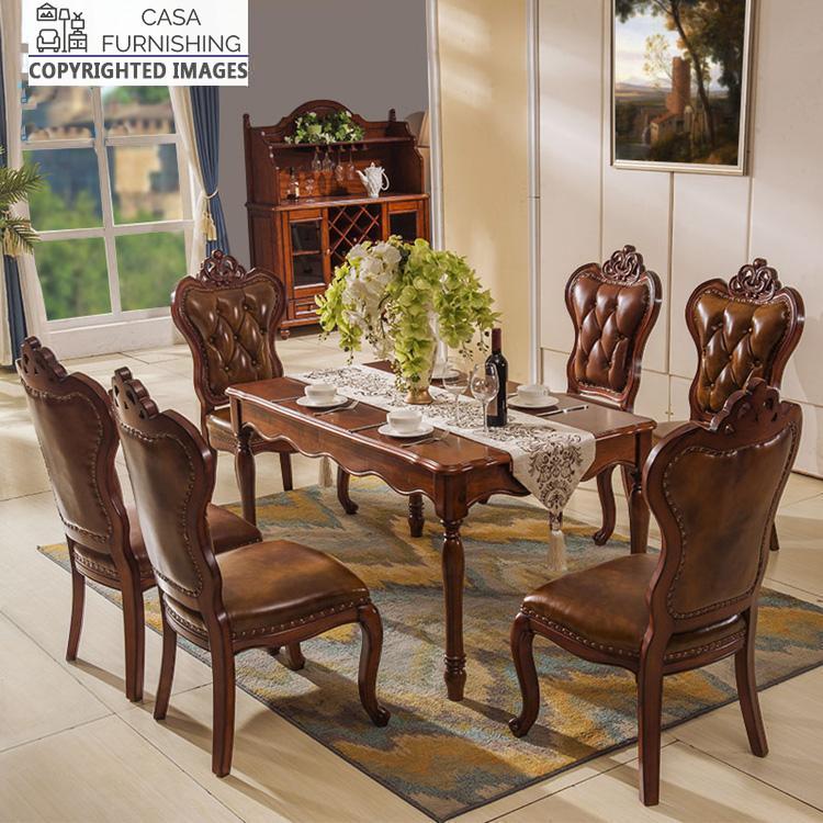 dining-room-sets-1-1-1-1.jpg Elegant solid wood traditional dining set with ornate carvings and premium leather seating from the Casa Furnishing collection.