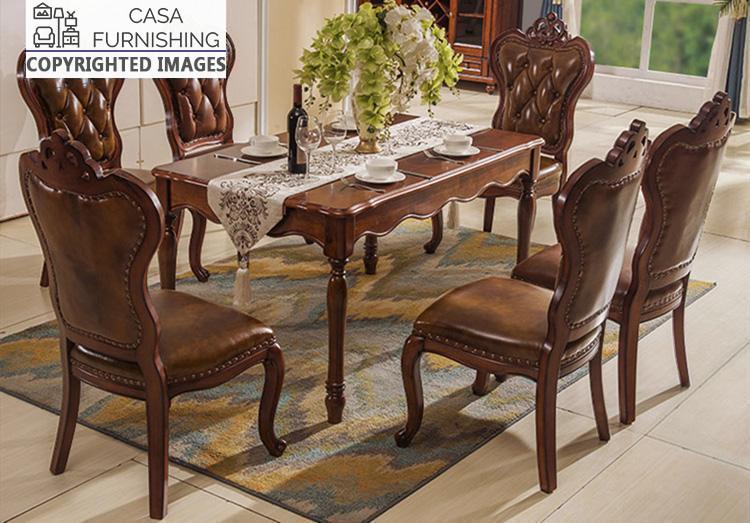 dining-room-sets-8-1-1-1.jpg Victorian-style solid wood dining table set with a dark mahogany finish and six high-back tufted brown leather chairs by Casa Furnishing.